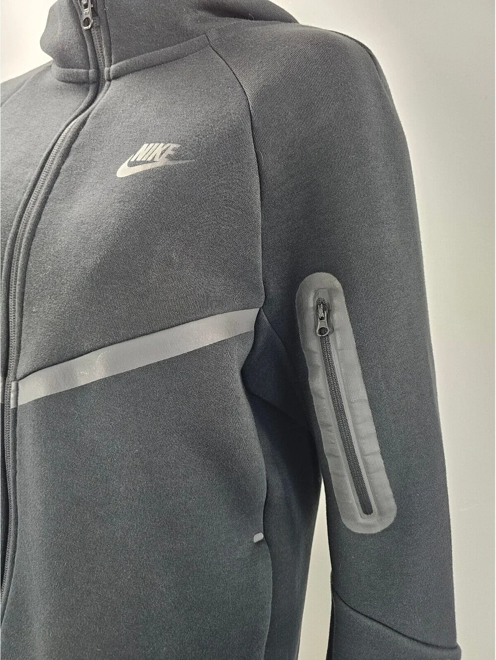 Nike Black Full-Zip Hoodie with Reflective Details and Zippered Arm Pocket